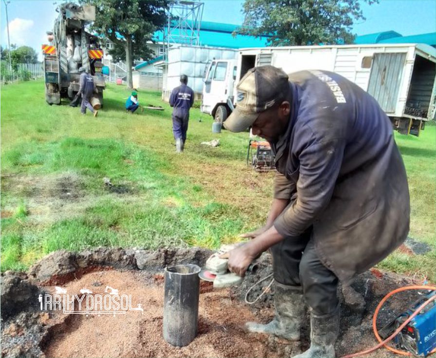 Our expert technician performing final cleaning and sealing procedures before capping the borehole to ensure safe water storage
