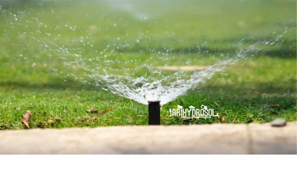 Compact pop-up sprinkler watering a green lawn, ideal for residential and commercial landscapes in Kenya